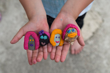 Playing with stones and play dough for children’s activities in preschool or nursery.creative ideas for child development.back to school and happy teachers day concept.