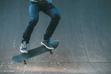 Urban man hobby. Skateboarding leisure and practice. Guy performing trick. Skate park ramp. Action shot. Copy space. - Powered by Adobe