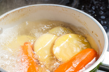 Potatos and carrots cooking