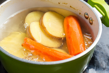 Potatos and carrots cooking