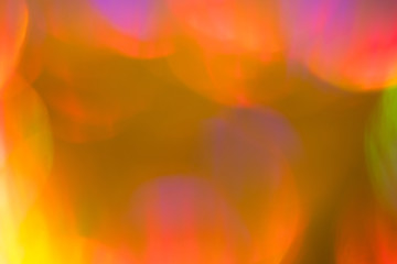 Blurred neon lights. Abstract lens flare effect background. Bokeh illuminated glow.