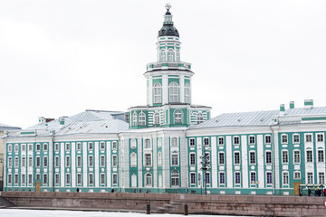 Fototapeta na wymiar Kunstkamera (Museum of Anthropology and Ethnography named after Peter Great of Russian Academy of Sciences, construction 1718-1734 years) on Universitetskaya embankment, St. Petersburg, Russia