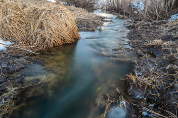 Beautiful transparent spring creek