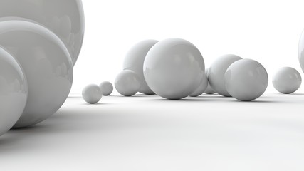 3D illustration of balls of different sizes on a white surface. The idea of order, chaos and abstraction. Comparative image of the geometry of space. 3D rendering isolated on white background.