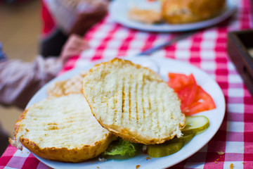 ingredients for making sandwiches with rolls on the table