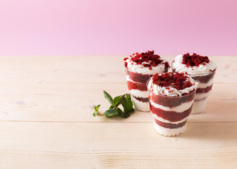 Homemade cake dessert. Trifle on pink background