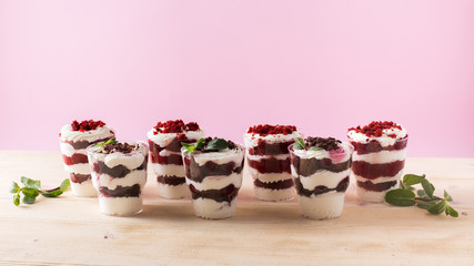 Homemade cake dessert. Trifle on pink background