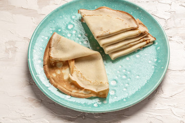 Staple of yeast pancakes, traditional for Russian pancake week. Top view. Flat lay. space for text