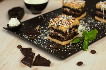 Still life on the table. Sweet cake grated pie and a hot drink .