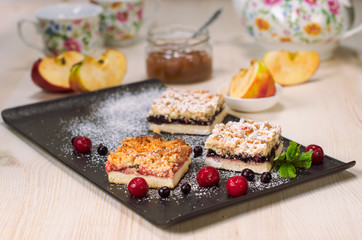 Still life on the table. Sweet cake and a hot drink .