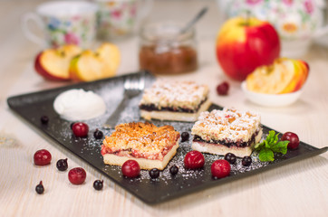 Still life on the table. Sweet cake and a hot drink .