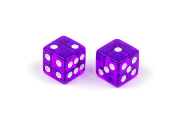 Two purple glass dice isolated on white background. Two and one.