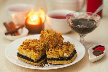 Still life on the table. Sweet cake and a hot drink .