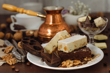 Still life on the table. Sweet cake and a hot drink .