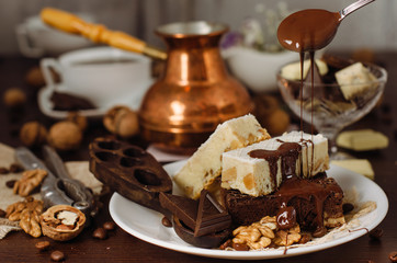 Still life on the table. Sweet cake and a hot drink .