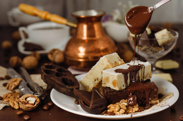 Still life on the table. Sweet cake and a hot drink .