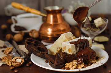 Still life on the table. Sweet cake and a hot drink .