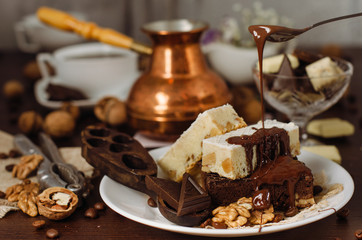Still life on the table. Sweet cake and a hot drink .