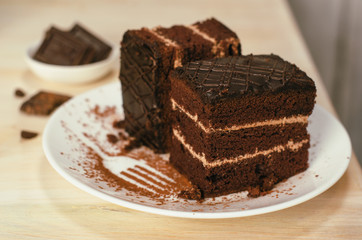 Still life on the table. Sweet cake and a hot drink . chocolate cake .