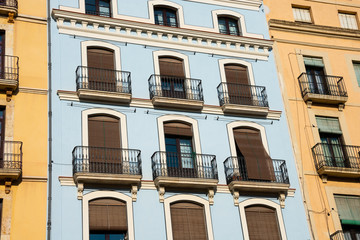 Fototapeta na wymiar Old building facade and balconies. Tarragona, Spain