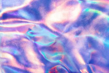 Abstract trendy holographic background in 80s style. Real texture in violet, pink and mint colors...