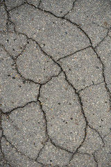 destructed tar road in a town