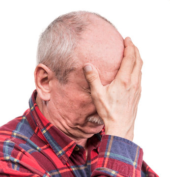  Healthcare, pain, stress and age concept. Sick old man. Senior man suffering from headach over white background