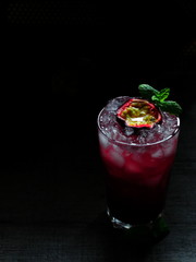 Coctail with passion furit on top