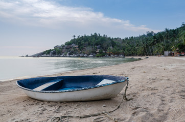 Fototapeta na wymiar Fishing boat on the shingle beach