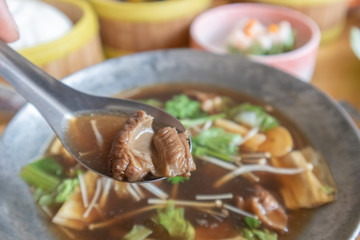 Bak kut teh or meat bone tea, delicious soup in southern of Thailand