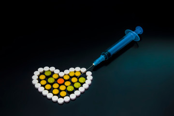 pill heart and syringe