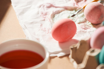 Easter eggs and colored kitchen paper