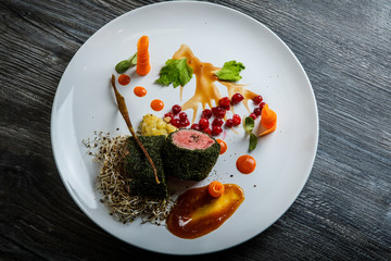 top view medium raw meat in green dill served with wheat sprouts