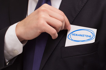 Business, technology, internet and networking concept. Young entrepreneur showing keyword:...