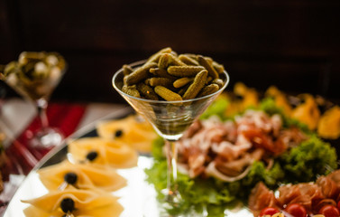 Buffet table of reception with cold snacks, meat and salads