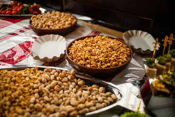A plate of nuts on a banquet table