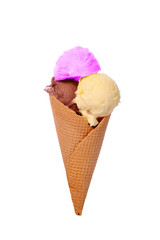 Ice cream cone with three different scoops of ice cream