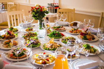 Appetizers and salads on the banquet table