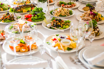 Appetizers and salads on the banquet table