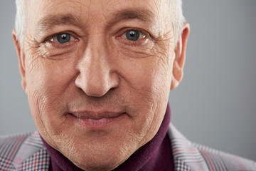 Portrait of attractive mature man smiling peacefully
