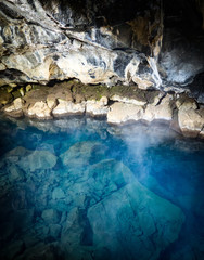Blue pool in a cave in Iceland