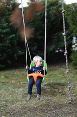 child on a swing