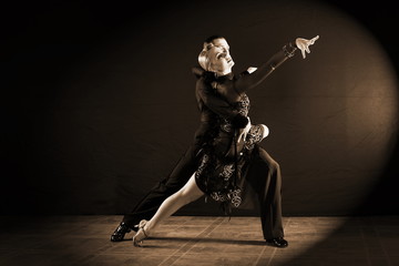 dancers in ballroom isolated on black background
