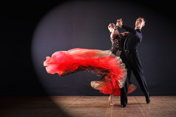 dancers in ballroom isolated on black background