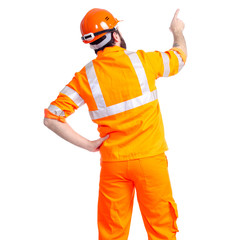 Man worker road constructor looking showing pointing on white background isolation, back view