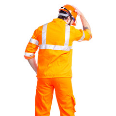 Man worker road constructor looking, hands on head helmet on white background isolation, back view