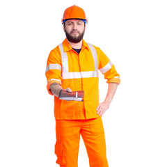 Man worker road constructor looking, notebook and pen in hand on white background isolation