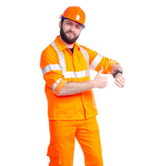 Man worker road constructor looking on watch, deadlines on white background isolation