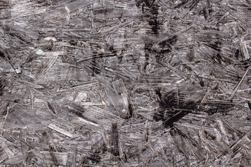 Closeup image of black chipboard