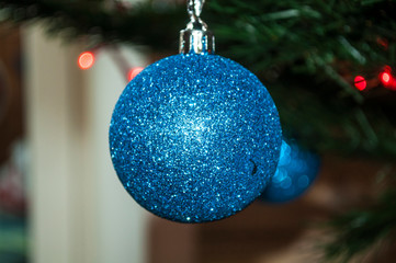 blue christmas ball on tree